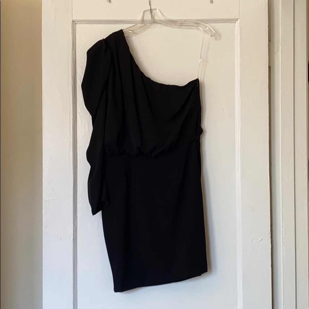 One shoulder little black dress.